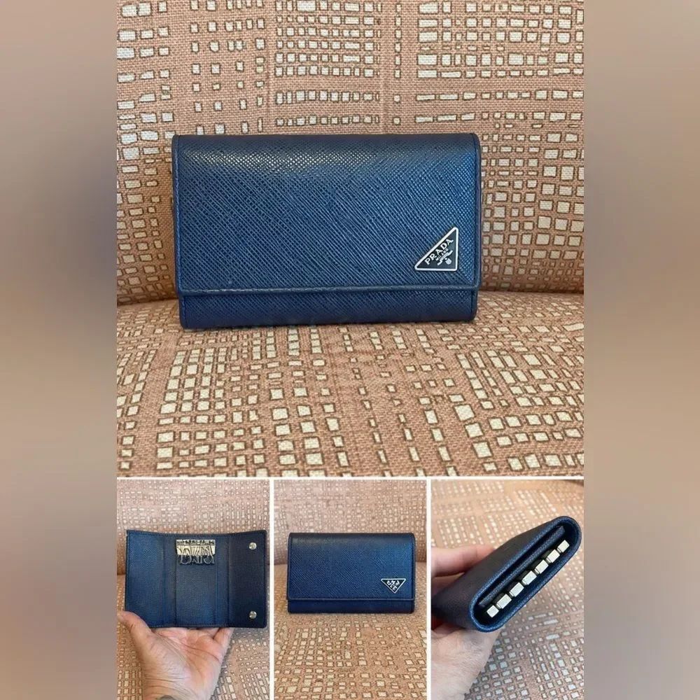 Prada saffiano leather key case in rich navy blue with signature triangle logo.